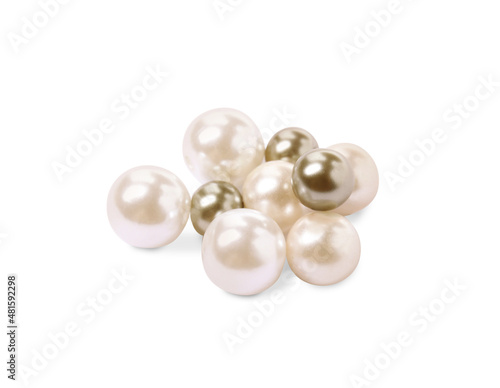 Many beautiful oyster pearls on white background