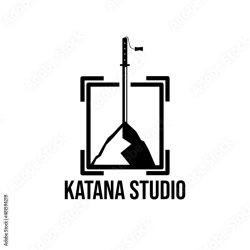 simple katana logo stuck on a rock