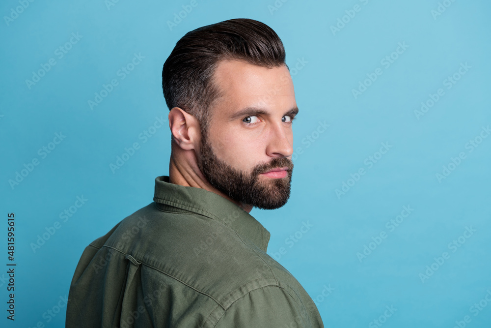 Obraz premium Back view photo of hot attractive guy barbershop model gel lotion brown hair isolated on blue color background