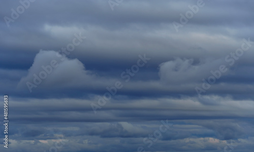 beautiful blue sky with clouds in the evening as abstract background © soleg