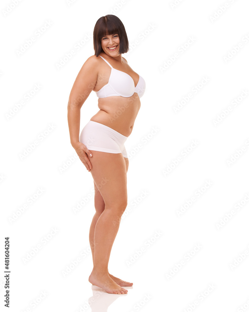 Curvy confidence and charm. Full length studio shot of a young model in underwear isolated on white.
