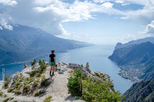 garda lake young hiker with camera beautiful view

