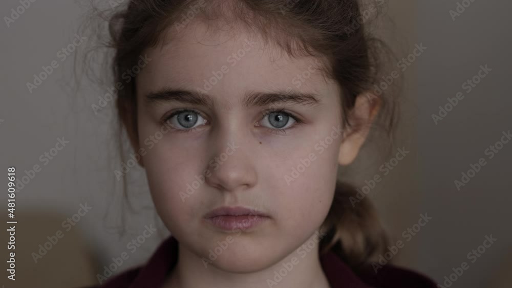 Portrait Sad Little Child Girl Looking at Camera. Thinking Curiosity Child Looking at Camera Closeup Indoors. Depressed Face Eyes Serious Contemplative Child. Serious Student Having Problems at School Portrait Sad Little Child Girl Looking at Camera. Thinking Curiosity Child Looking at Camera Closeup Indoors. Depressed Face Eyes Serious Contemplative Child. Serious Student Having Problems at School