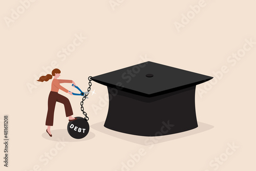 Student loan debt pay off or forgiveness program, cut education expense or reduce fee concept, young adult woman cut chain to relief from student loan debt burden metal ball from graduated mortarboard photo