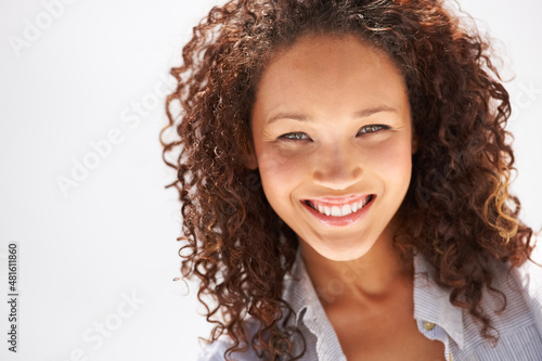 Fresh-faced and naturally beautiful. Cropped view of a naturally gorgeous young woman smiling at you.