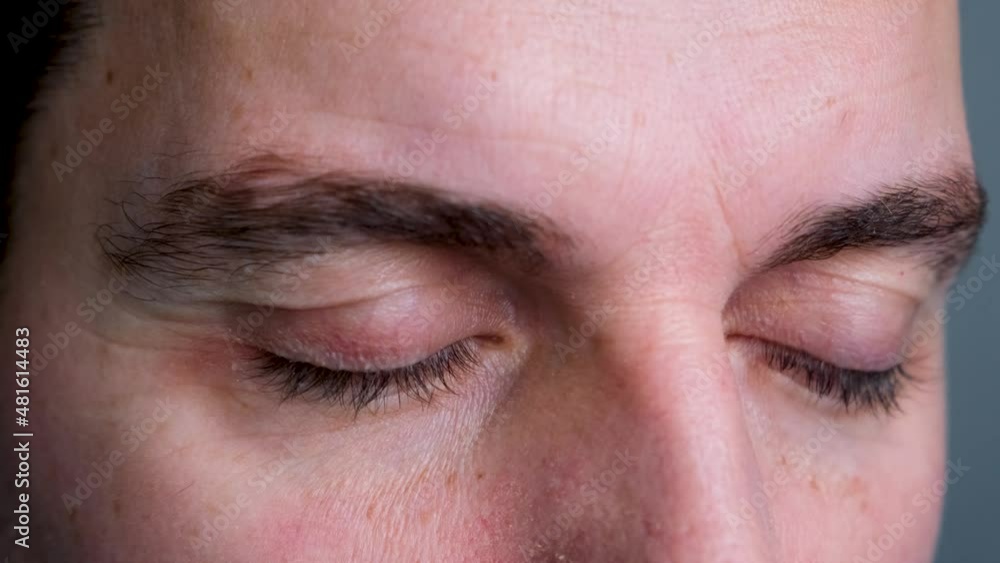 bright blue eyes men look down thoughtfully blinking bright blue eyes men look down thoughtfully blinking