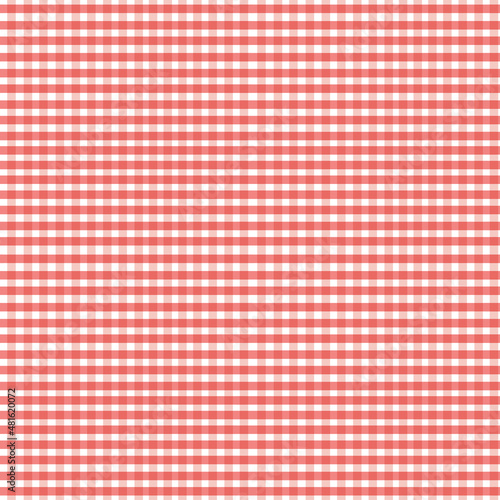 Red seamless checkered plaid fabric pattern texture. Modified stripes consisting of crossed horizontal and vertical lines forming squares.