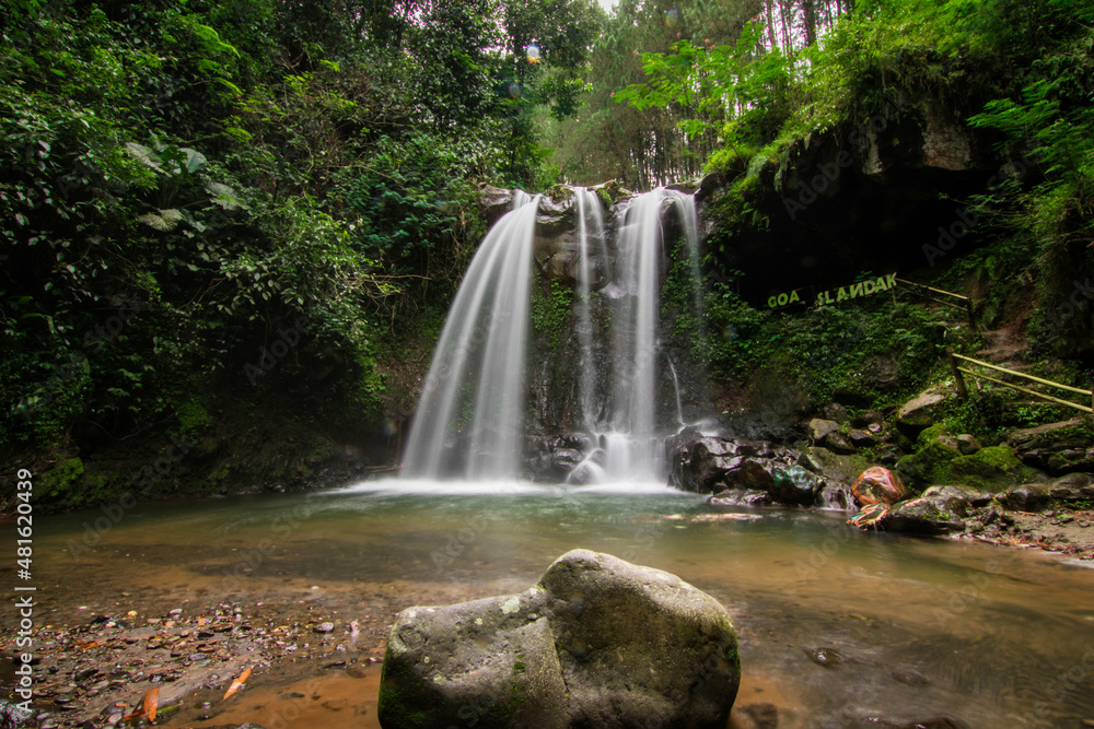 Fototapeta premium Goa Slandak, Beautiful Waterfall From the Foot of Mount Merabu