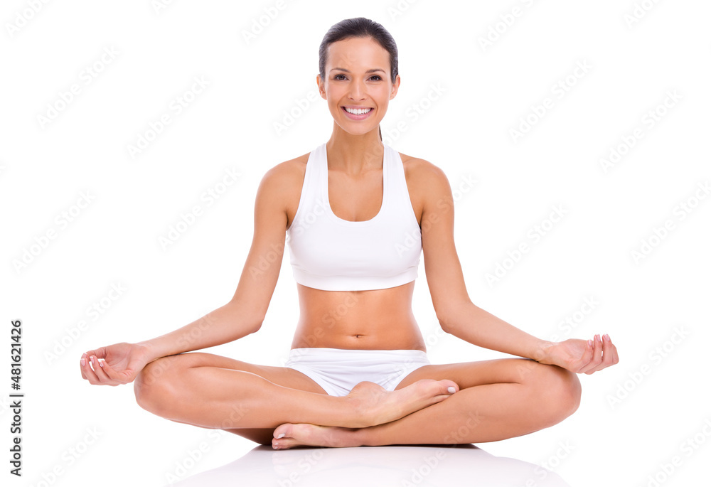 Fitness doesn't only include the body. Studio shot of a young woman in the lotus position isolated on white. Fitness doesn't only include the body. Studio shot of a young woman in the lotus position isolated on white.