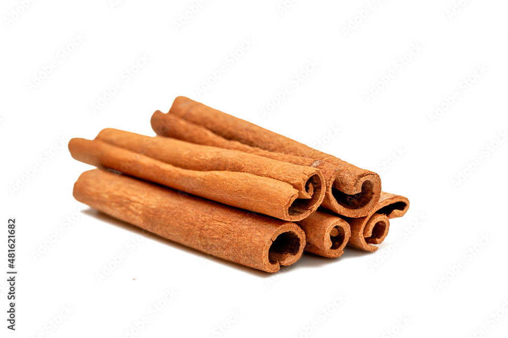Several cinnamon sticks on a white background Several cinnamon sticks on a white background