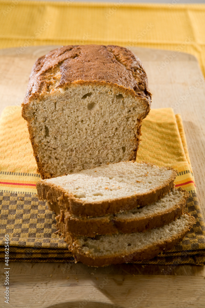 Delicious freshly baked bread, sliced and ready to serve in a homestyle setting.