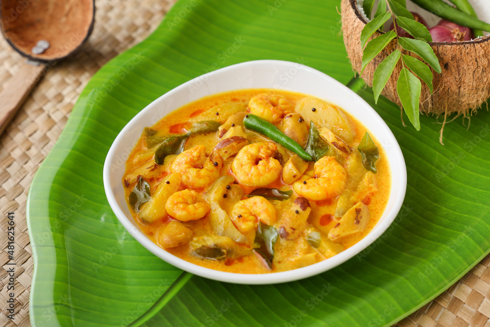 Serving prawn mango curry Chemmeen Manga shrimp in coconut milk Spicy Kerala fish curry popular Indian seafood, non veg food side dish rice, appam Goa Tamil Nadu Bengal Sri Lankan Serving prawn mango curry Chemmeen Manga shrimp in coconut milk Spicy Kerala fish curry popular Indian seafood, non veg food side dish rice, appam Goa Tamil Nadu Bengal Sri Lankan