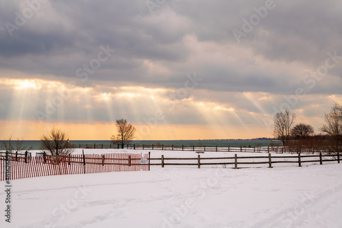 Dramatic clouds over an offleash dog park on the shore of  Lake Ontario..  Suitable for background, space for text. photo