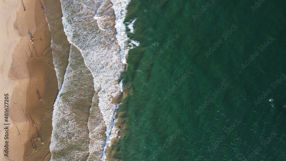 Aerial view of an emerald green sea and big foaming waves. Indian Ocean. Dikwella beach. Sri Lanka Aerial view of an emerald green sea and big foaming waves. Indian Ocean. Dikwella beach. Sri Lanka
