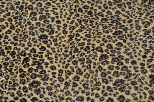 Leopard pattern background with fabric texture