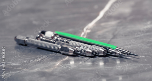 Sharp scrapers with collets. The concept of tools for mechanical cleaning of different metals.