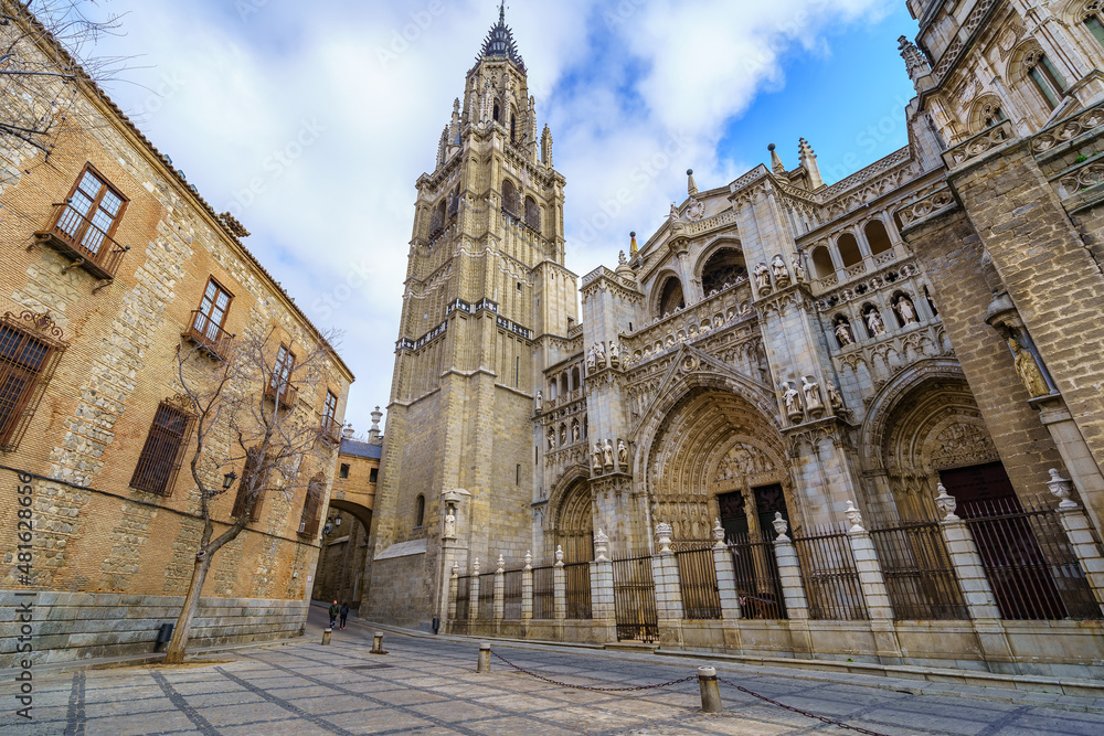 Immense cathedral of Toledo with its high medieval towers. Toledo Spain.