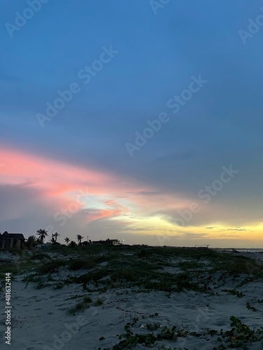 Sunset in North Colombia with Palms and colorful sky photo