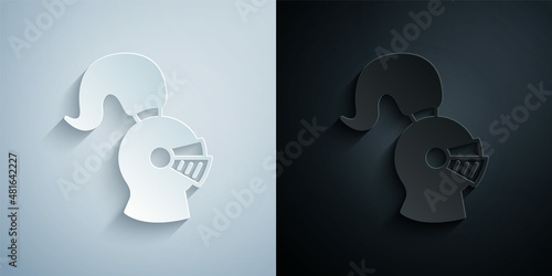 Paper cut Medieval iron helmet for head protection icon isolated on grey and black background. Knight helmet. Paper art style. Vector