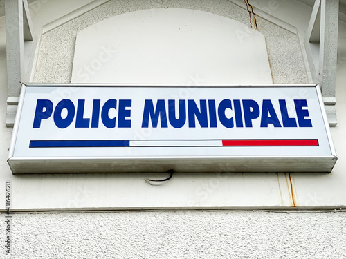 "Municipal Police" french sign at the entrance of a police station