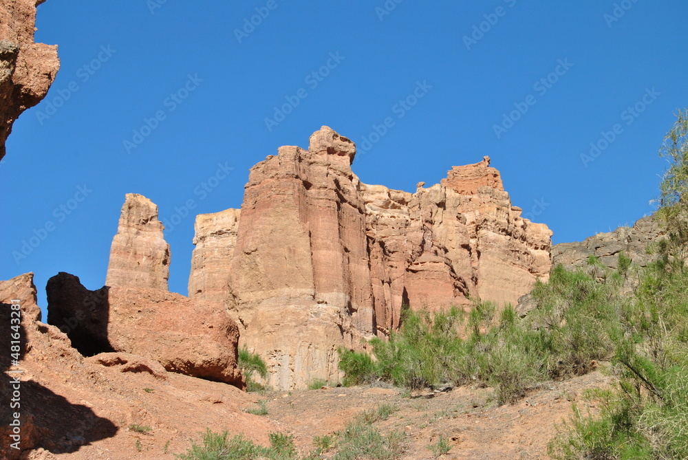 Charyn Canyon in Kazakhstan. Valley of castles in Kazakhstan. An analogue of the American Grand Canyon. Aeolian landforms. Colorful stone mountains in the desert. Desert. Plain. Charyn Canyon in Kazakhstan. Valley of castles in Kazakhstan. An analogue of the American Grand Canyon. Aeolian landforms. Colorful stone mountains in the desert. Desert. Plain.