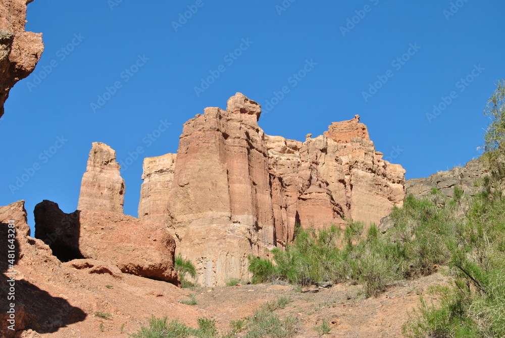 Charyn Canyon in Kazakhstan. Valley of castles in Kazakhstan. An analogue of the American Grand Canyon. Aeolian landforms. Colorful stone mountains in the desert. Desert. Plain.