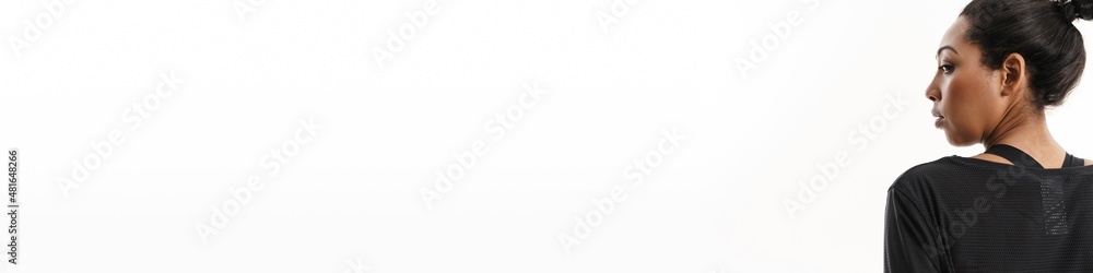 Confident african american woman posing in profile Confident african american woman posing in profile