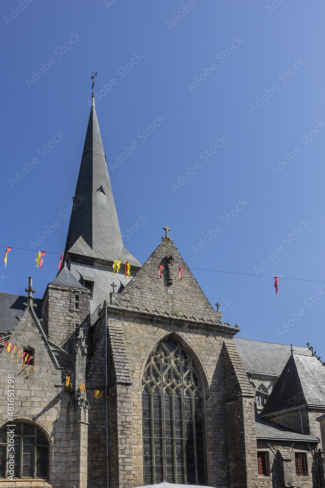 Collegiate Church Saint-Aubin at Psalette square in medieval town of Guerande. Current architecture of Saint-Aubin Church dates from XV - XVI century. Guerande, Loire-Atlantique, Western France.