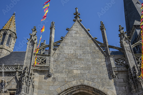 Collegiate Church Saint-Aubin at Psalette square in medieval town of Guerande. Current architecture of Saint-Aubin Church dates from XV - XVI century. Guerande, Loire-Atlantique, Western France. photo