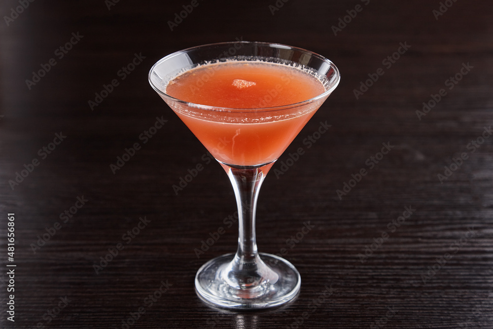 Alcoholic drinks at the bar. Bartender's hands in the process of making drinks. Alcoholic drinks at the bar. Bartender's hands in the process of making drinks.