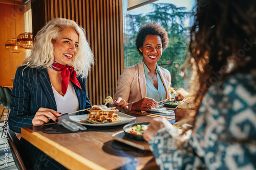 Three business women having lunch break