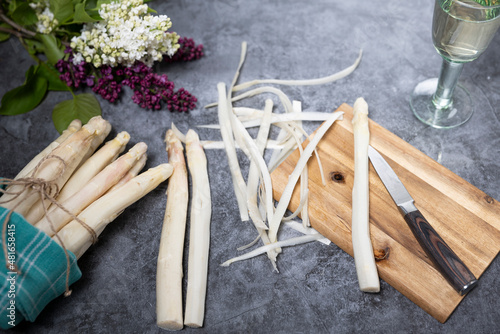 Bunch of fresh white asparagus on a stone table