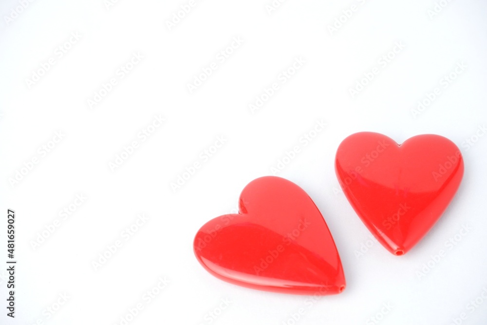 two red hearts isolated on white background,with copy space. Valentine concept