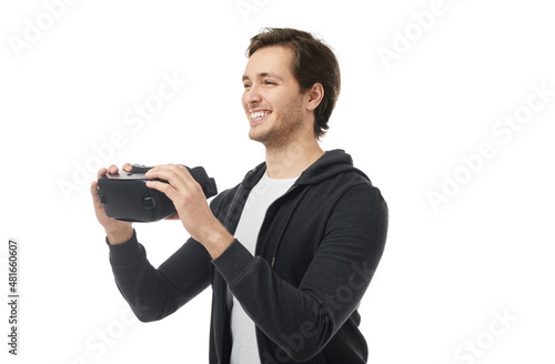 Delighted man with VR goggles in studio © kegfire