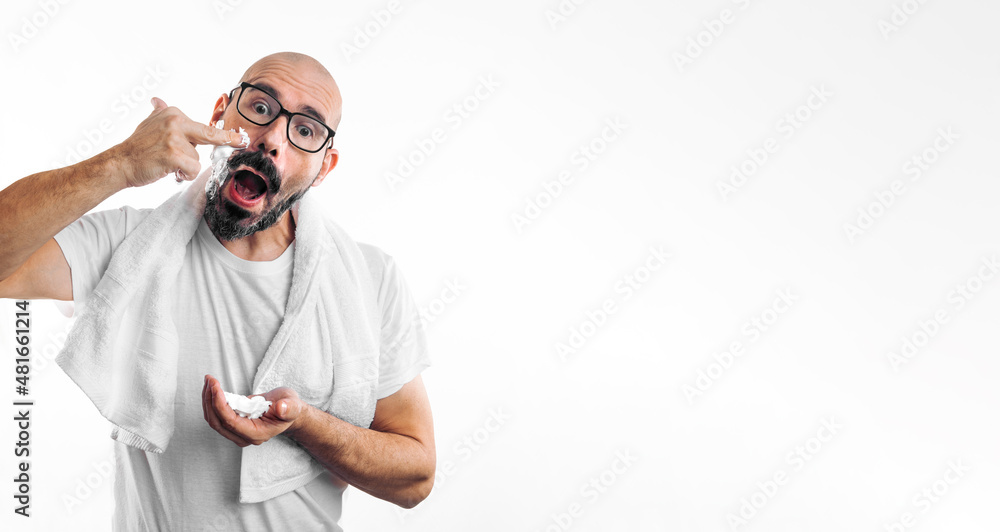 funny man with torso white shirt applying shaving foam insulated in white, funny man with torso white shirt applying shaving foam insulated in white,