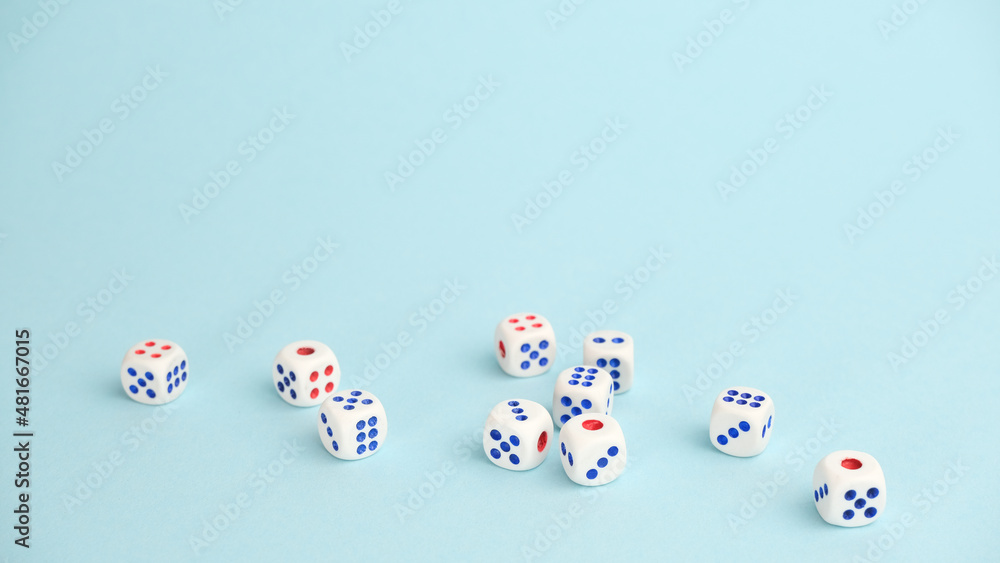 Dice cubes on a blue background. Creative idea, randomness concept. Dice cubes on a blue background. Creative idea, randomness concept.