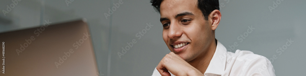 Brunette mid aged businessman wearing white shirt Brunette mid aged businessman wearing white shirt