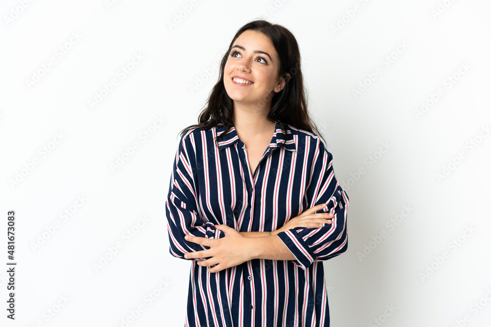Young caucasian woman over isolated background thinking an idea while looking up Young caucasian woman over isolated background thinking an idea while looking up