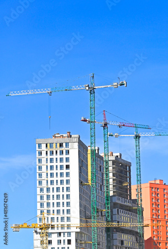 Crane and highrise construction site