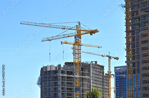 Crane and highrise construction site