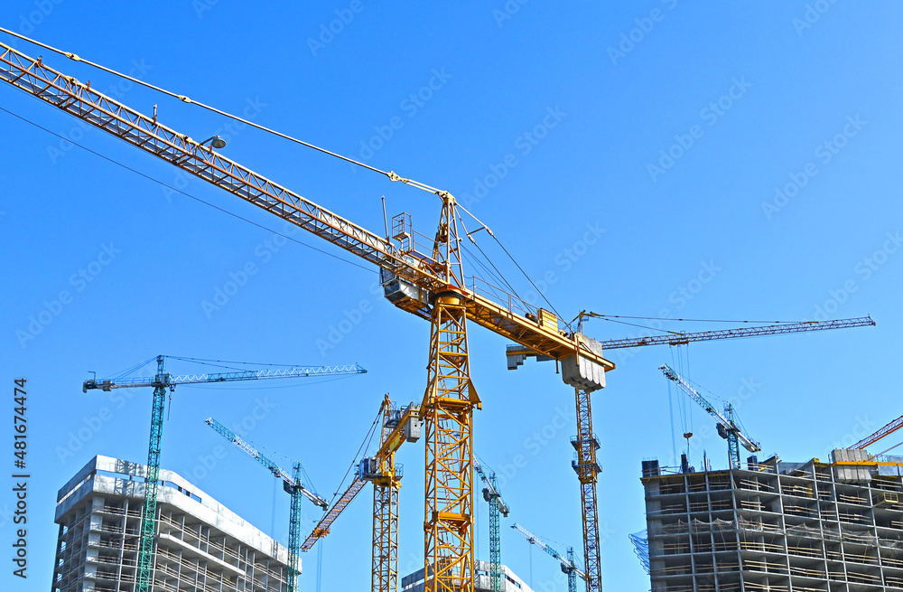 Crane and highrise construction site Crane and highrise construction site