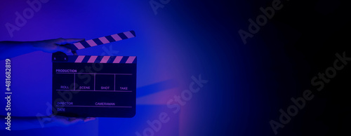 Fotografering Blurry images of movie slate or clapper board