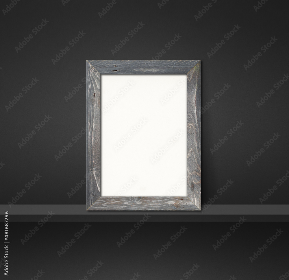 Wooden picture frame leaning on a black shelf. 3d illustration. Square background Wooden picture frame leaning on a black shelf. 3d illustration. Square background