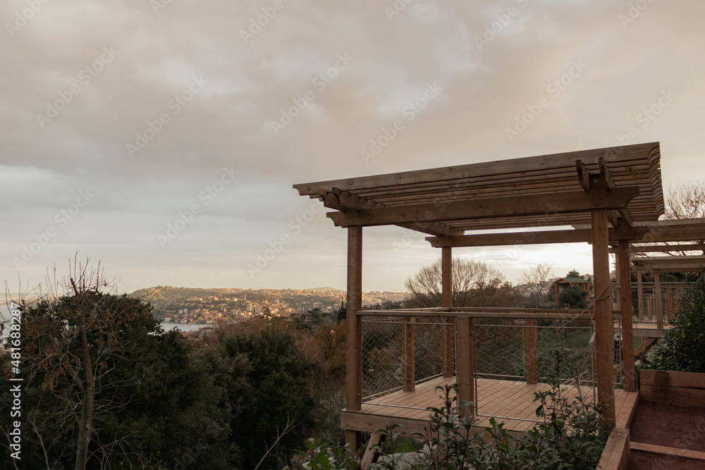 Observation platform. Sea and city view from top. Wooden structure. overcast weather. Observation platform. Sea and city view from top. Wooden structure. overcast weather.