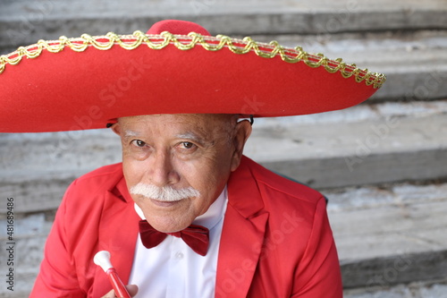 Mexican folklore performer with red outfit