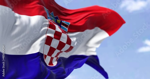 Detail of the national flag of Croatia waving in the wind on a clear day photo