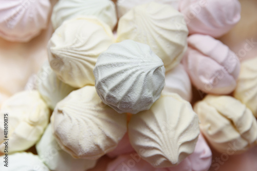 Multicolored air marshmallow according to a classic recipe at a confectionery factory  lies for sale to customers