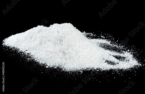 Pile of white snow isolated on a black background. White snow at night.