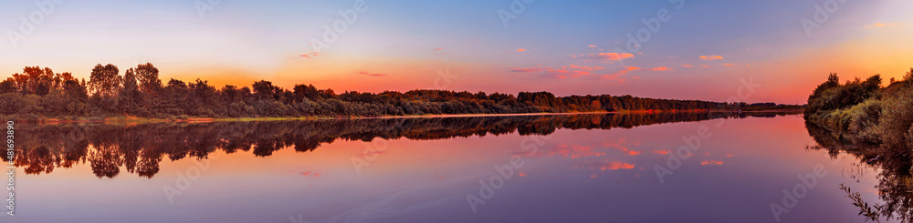 calm vyatka river at sunset on a summer evening