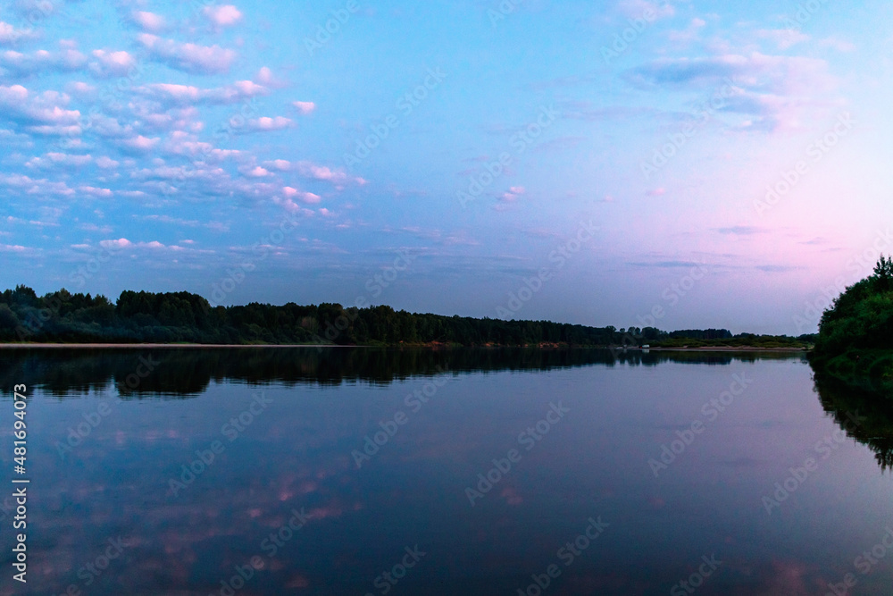 calm vyatka river at sunset on a summer evening